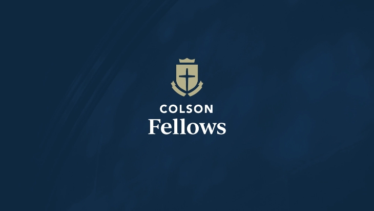 Dark blue textured background with Colson Fellows' gold shield icon centered on top of white text 